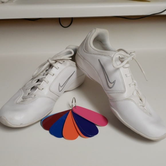 white nike shoes with colored swoosh